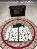 The North Face White and Black Bear Print Puffer Jacket